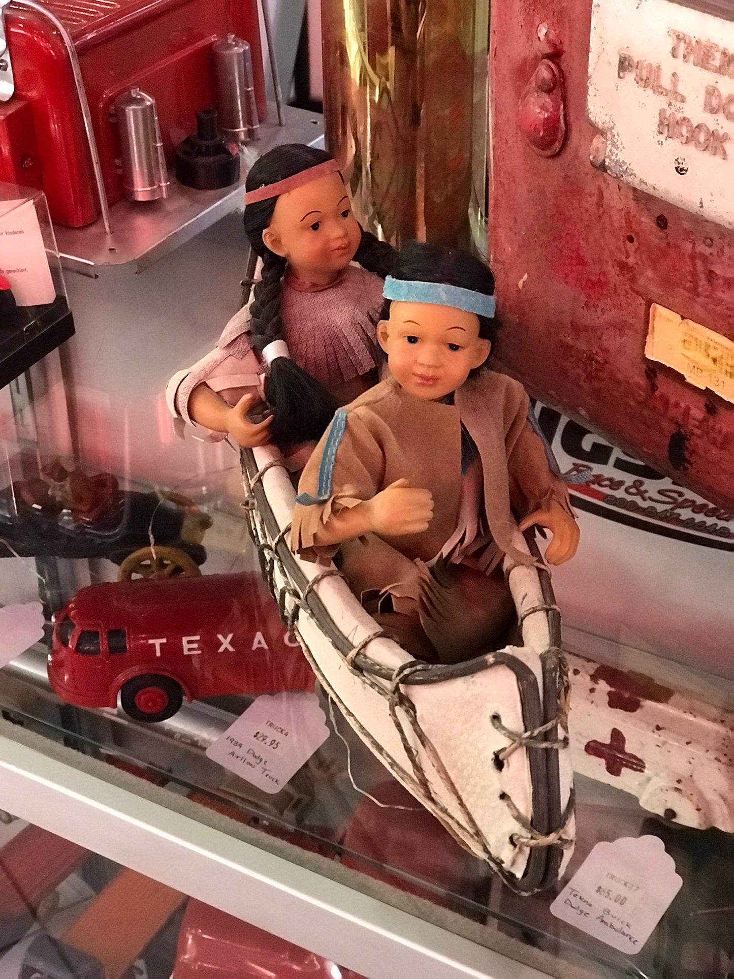 Native Americans In A Canoe